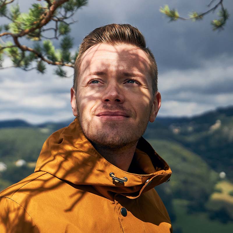 portrait of cheerful man in nature znafjrb.jpg